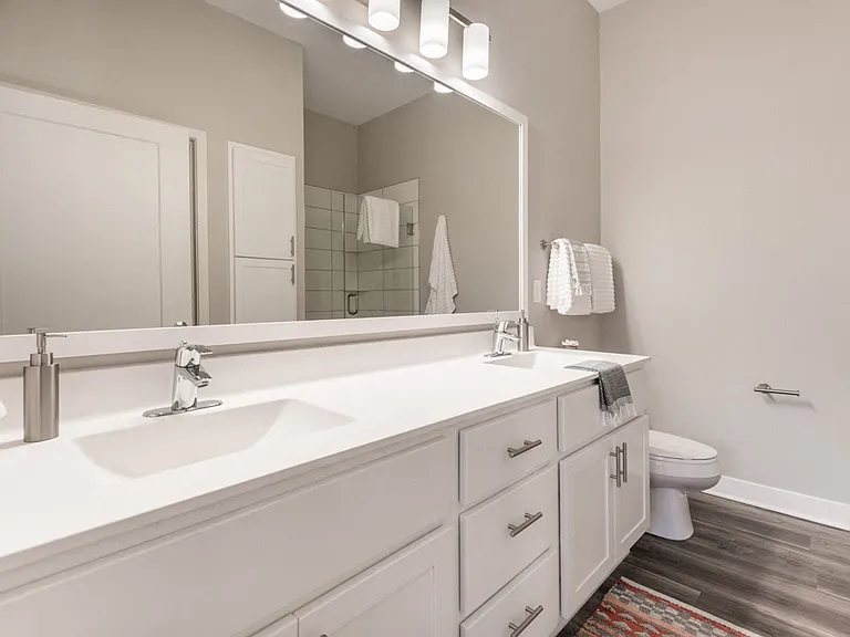 Stylish vanities with sleek lighting make your morning routine effortless.