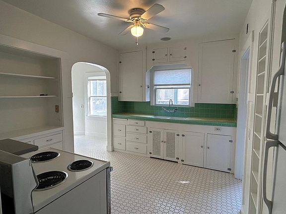 Kitchen with old range in photo