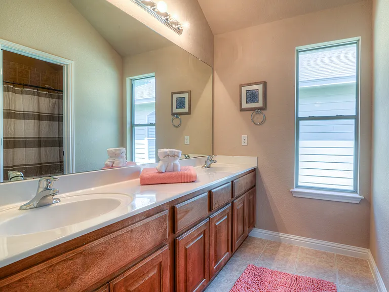 Full bath with double vanity upstairs