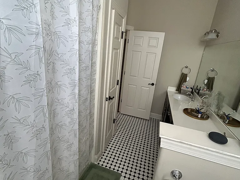 View of bathroom. Shower on the left.