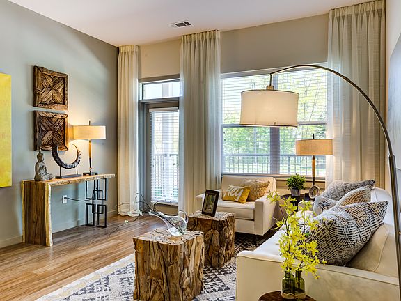 Living area looking out toward private patio/balcony