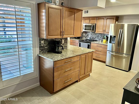 5th image of 9746 N 105TH Drive