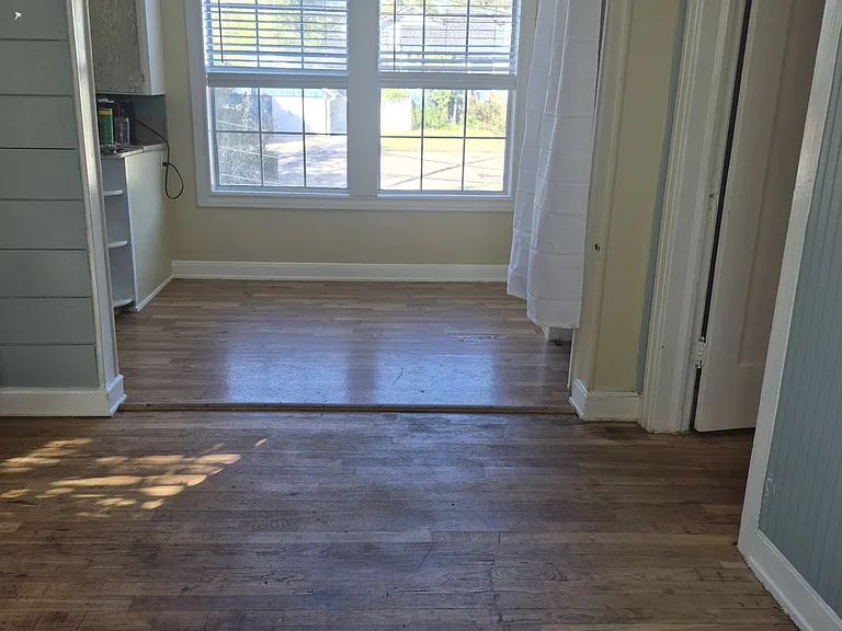 Dining area from Living room. Pantry on right, kitchen to the left.