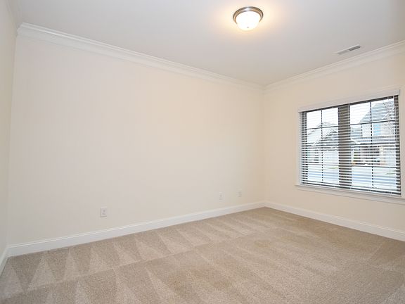 First floor guest bedroom or office is next to the front door.