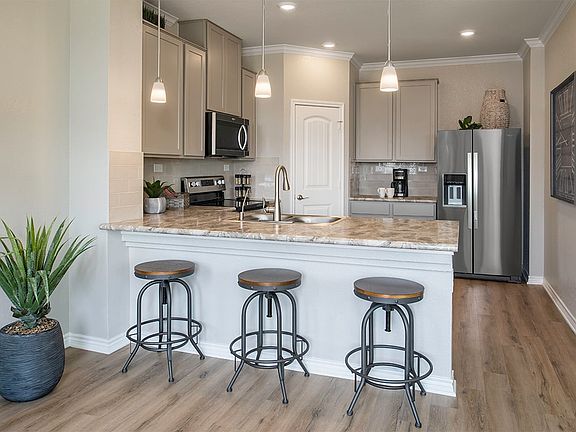 Plan 1780 Kitchen as modeled at The Overlook at Medio Creek