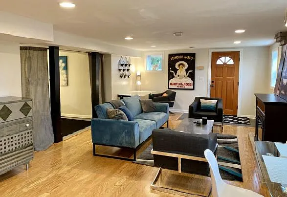Lower level daylight basement apartment or flexible space. This space has an open concept bedroom, an additional kitchen, an additional bathroom. It is accessible from the main floor as well as a seperate outside entrance. The main floor access can be clo