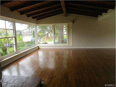 Bright living room with beautiful green view
