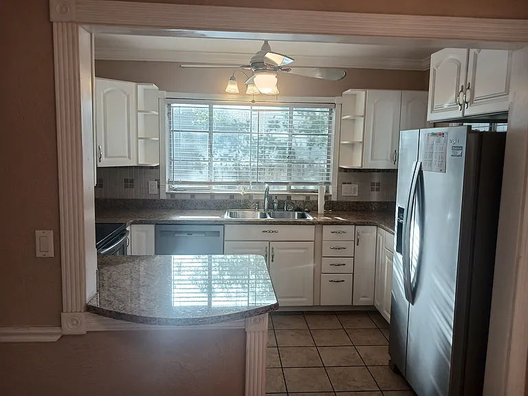 View of kitchen from dining area.