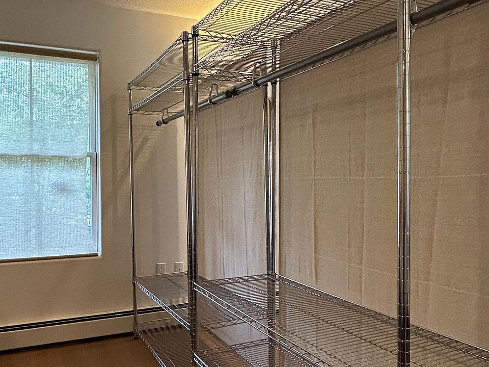 Moveable closets can be configured as a privacy wall for alcove bedroom or used in hall for closet only.