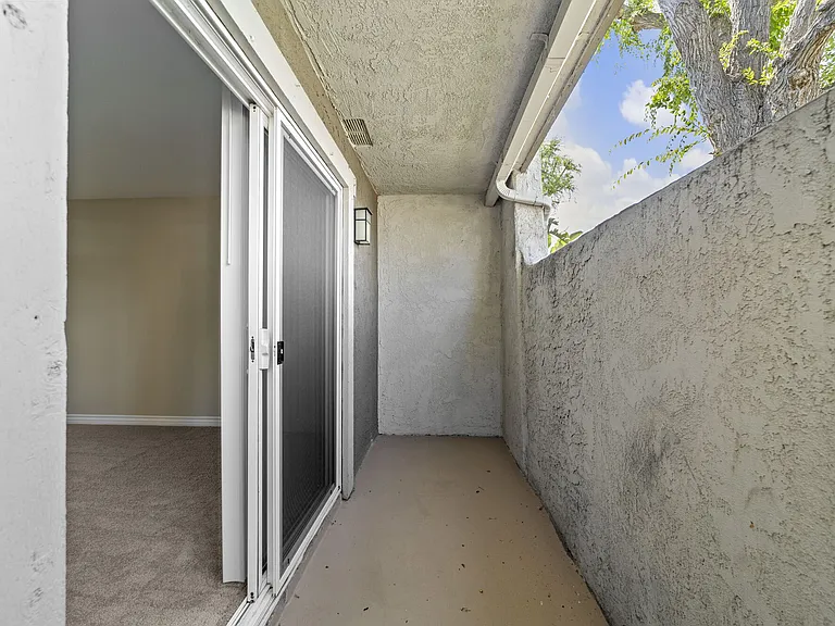 Private patios at Strada Apartments in Orange, CA