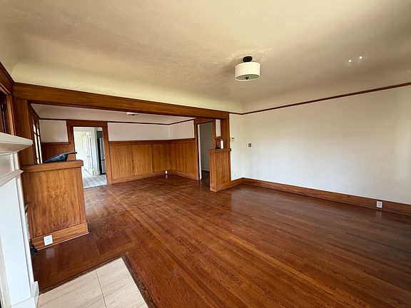 Living room and dining room (excuse the dusty floors due to new kitchen tile).
