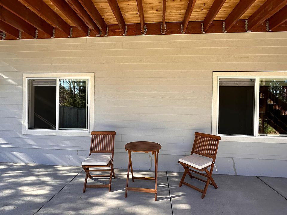 Outdoor patio space with bistro set.