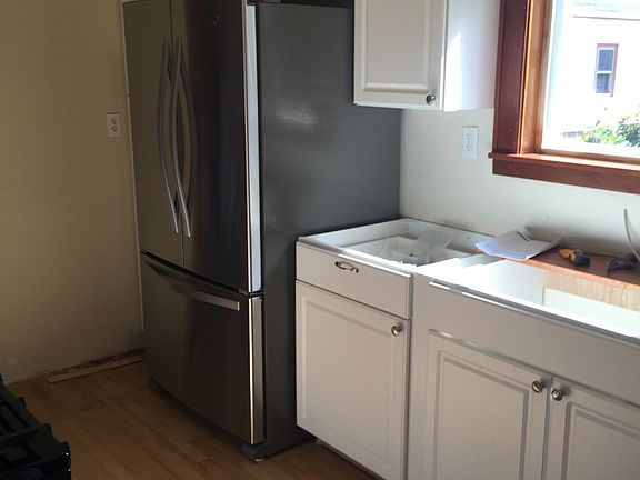 New cabinetry, stainless 25cf fridge