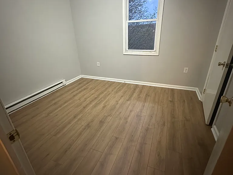 Second bedroom on second floor view 1