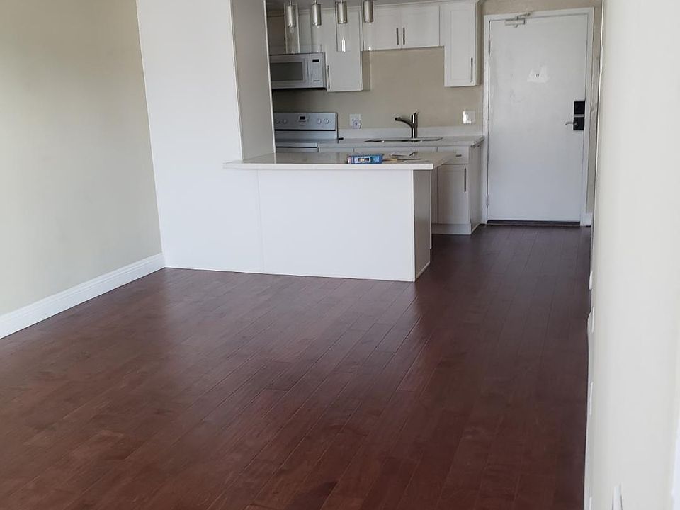Living room facing kitchen