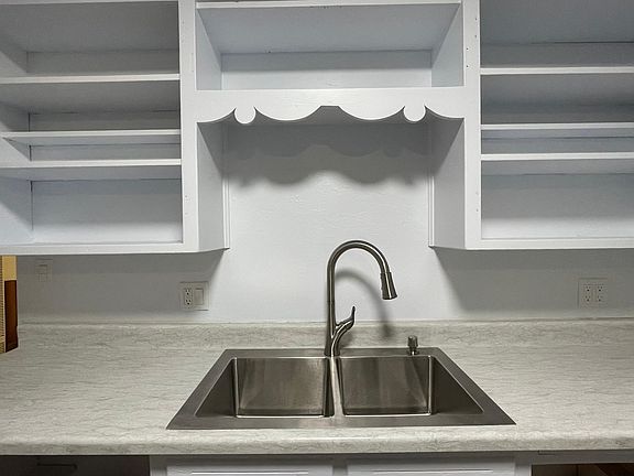 new countertops and sink, dishwasher also