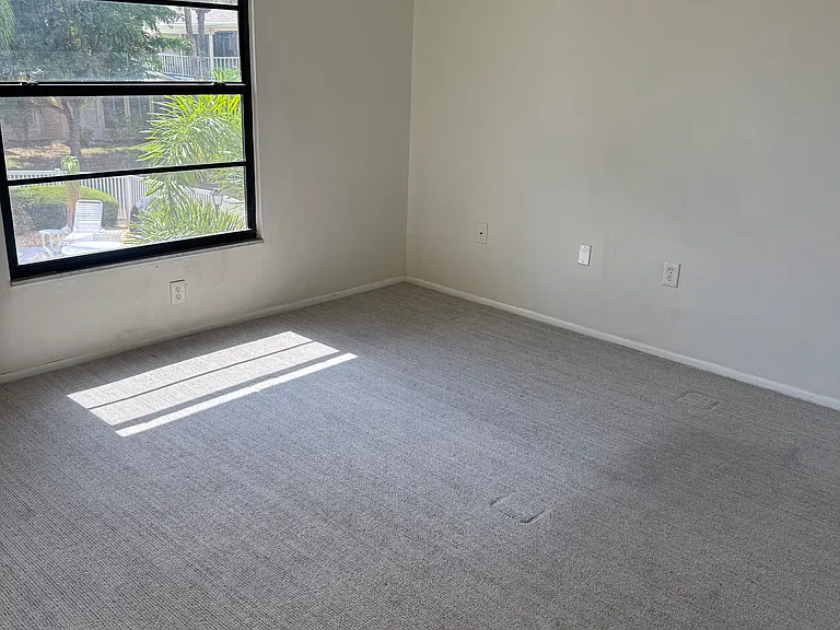 Primary Bedroom. New carpet.