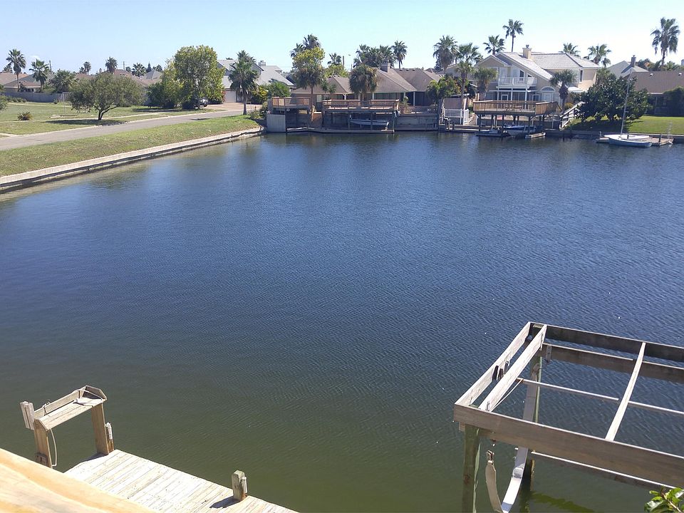 Wide canal with boat lift and fishing dock!