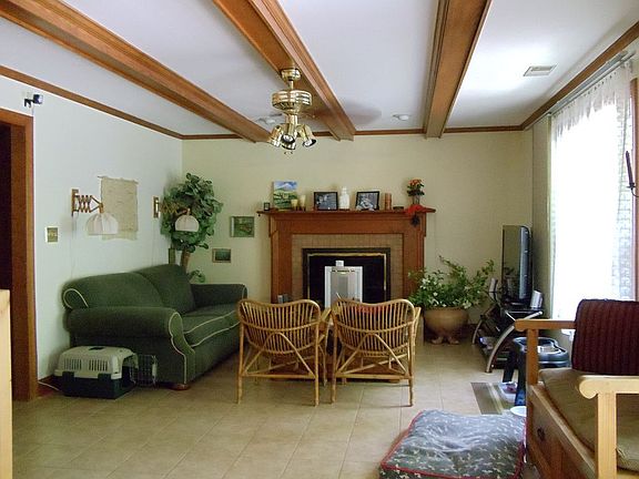 GR beamed ceilings/ WD frpl