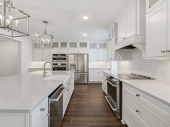 Kitchen with upper glass cabinets