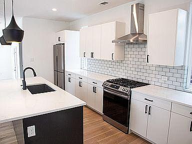 Quartz counters and brand new appliances.