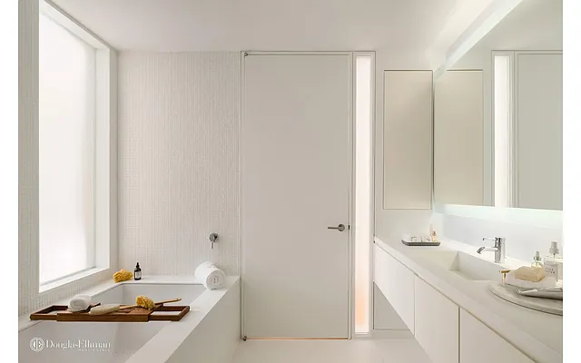 Sold by Douglas Elliman | media 18