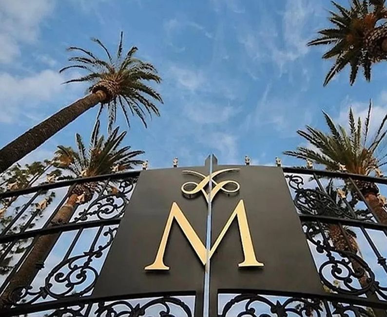 Entrance on Canoga Ave. with guard house, for visitors. There is also another entrance closer to the unit on Owensmouth Ave.that you will receive an access card as an additional entrance. There is no guard on owensmouth.