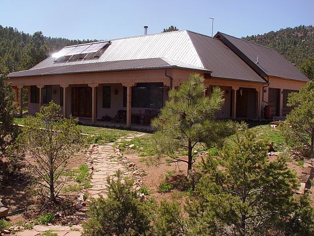 South and East side of the house with portal                       