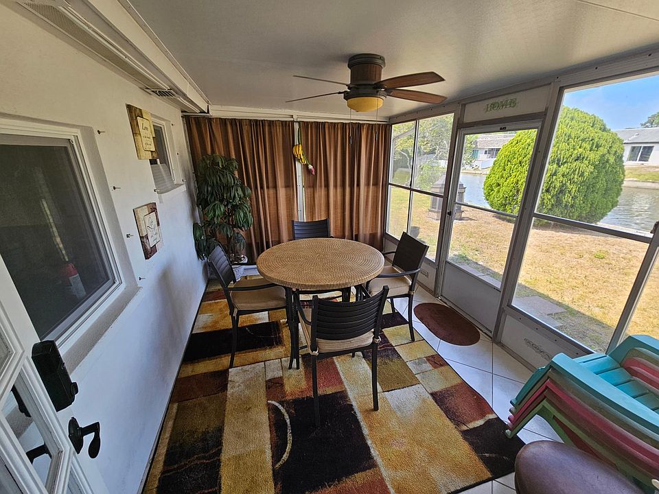 Lanai/Florida room over looking freshwarer canal.