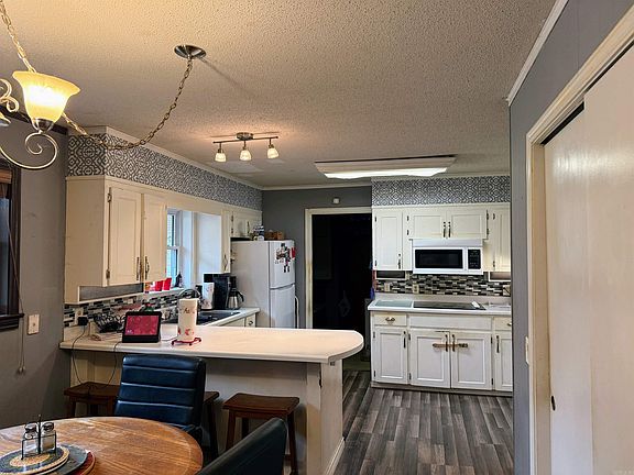 4th image of 9341 Highway 64