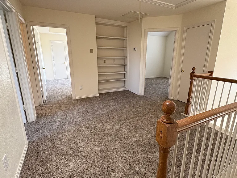 Game room upstairs with new carpet