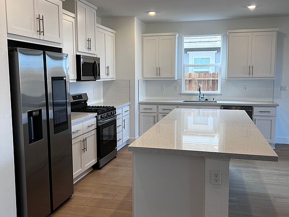 Kitchen island and app enabled appliances