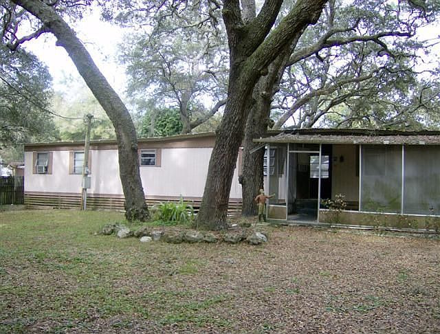 Shady fenced lot