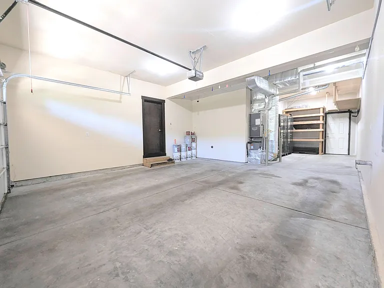 3 car Garage with plenty
