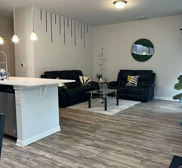 Living room viewed from kitchen/eat in area