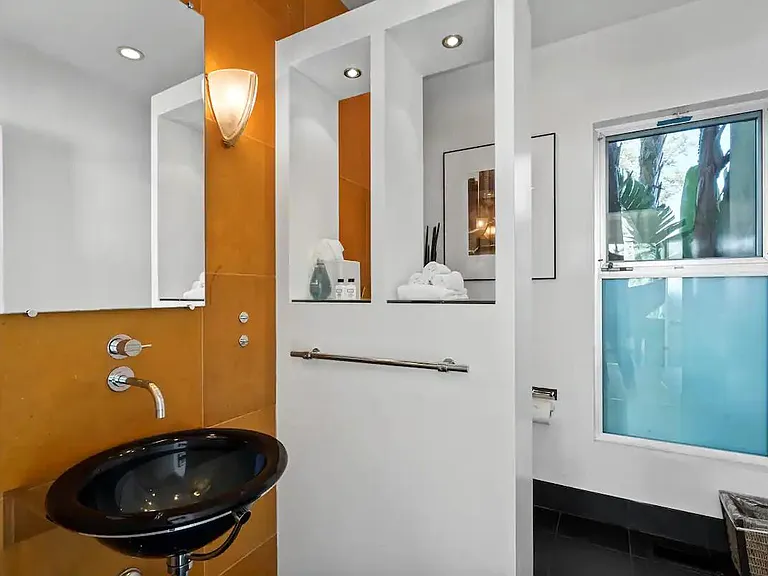 The guest bathroom is designed for ultimate comfort and convenience, ensuring a pleasant experience throughout your visit.
