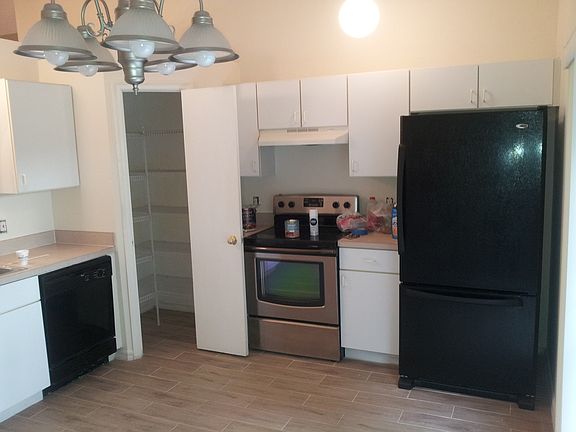 Kitchen with large pantry closet