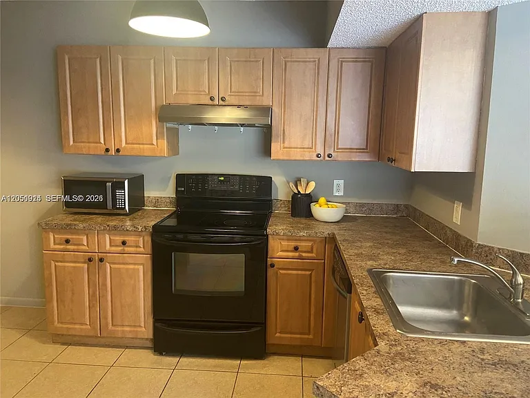 8871 Wiles Rd #301 — Photo 4
