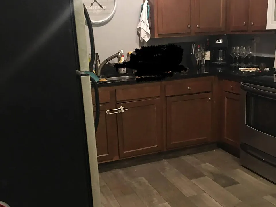 Eat in Kitchen with stainless appliances & granite countertops.