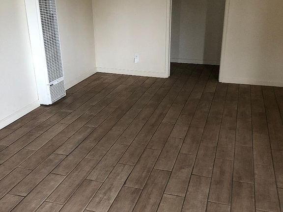 Living area has wood flooring