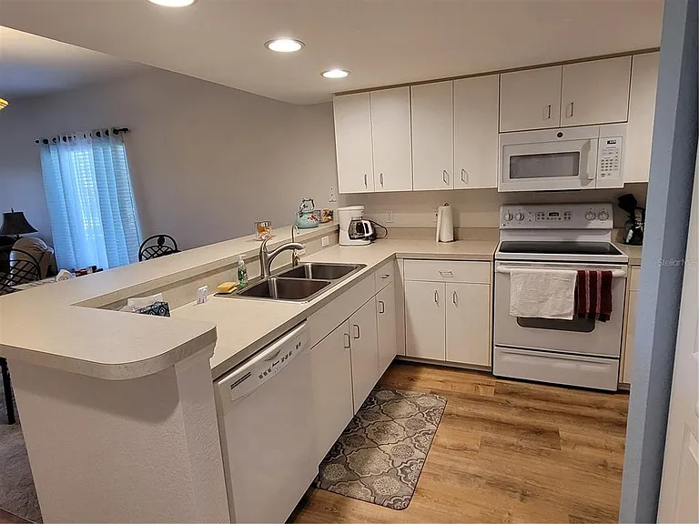 9550 Fiddlers Green Cir #105 — Photo 4