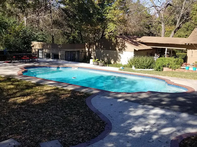 Updated laundry facilities are located to the right of the breezeway. Currently being fixed up. More pictures to come. Tenant shares laundry room with owners, but owners are very conscientious. Tenants have a dedicated shelves for laundry supplies.