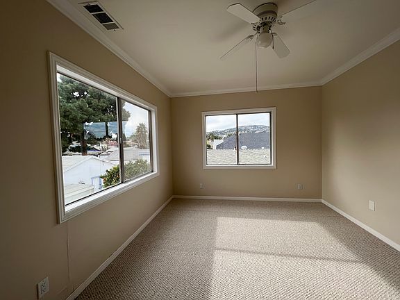 Back bedroom with walk in closet.