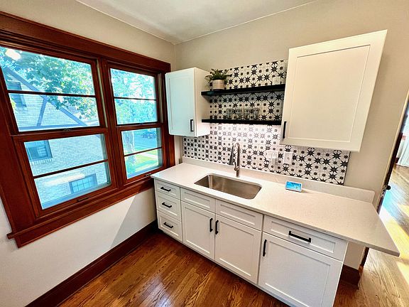 Big, bright sound proof windows in the kitchen with tons of natural lighting.