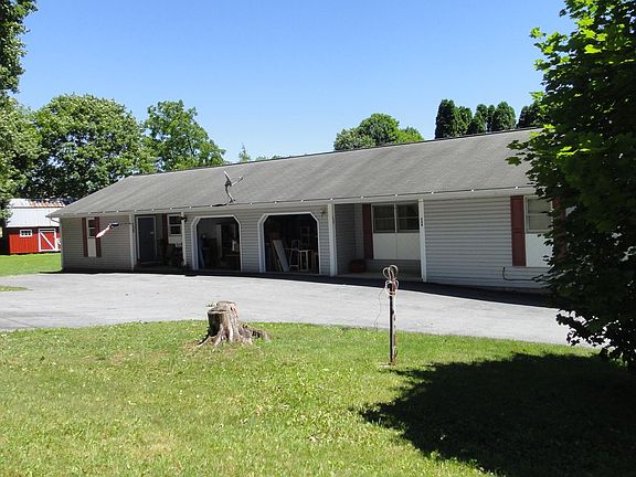 Photo showing both apartments separated by attached garages