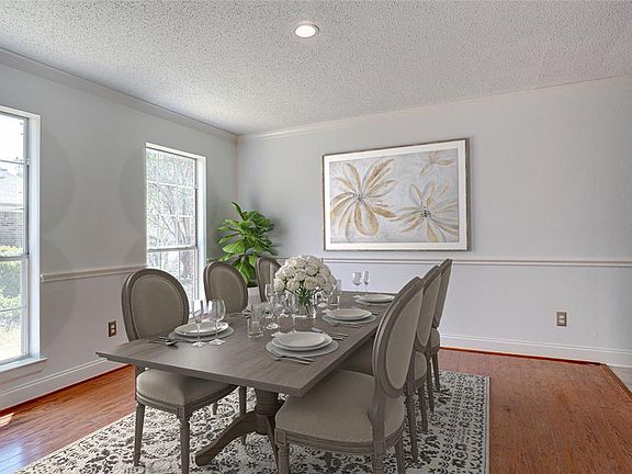 Spacious dining room adjacent to kitchen for easy entertaining...