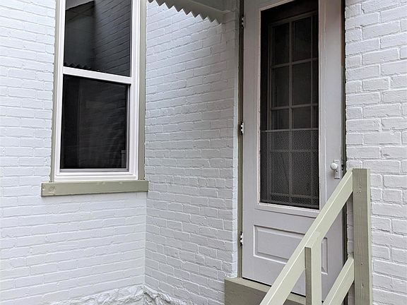 back side steps coming out of the kitchen