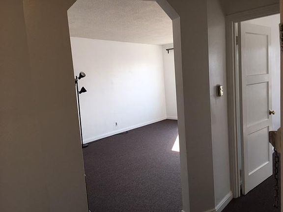Next to the living room is the master bed room