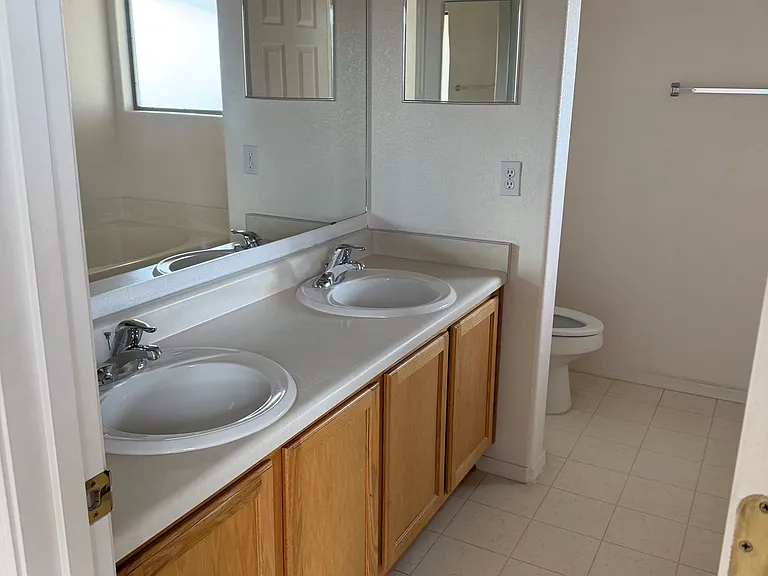 Master bath has large tub and walk-in shower
