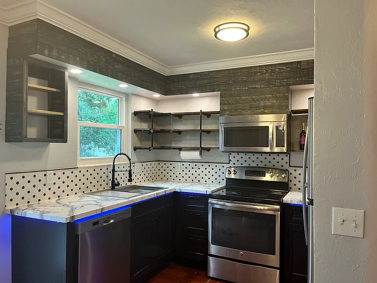 Open iron pipe display shelving.